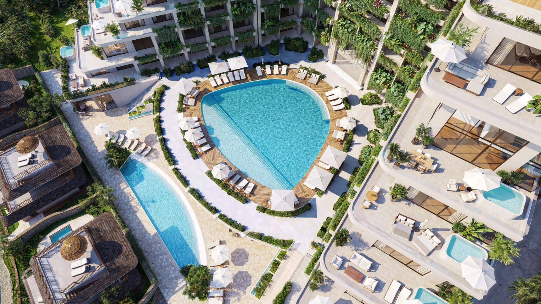 Aerial view of the pool and beachfront villas